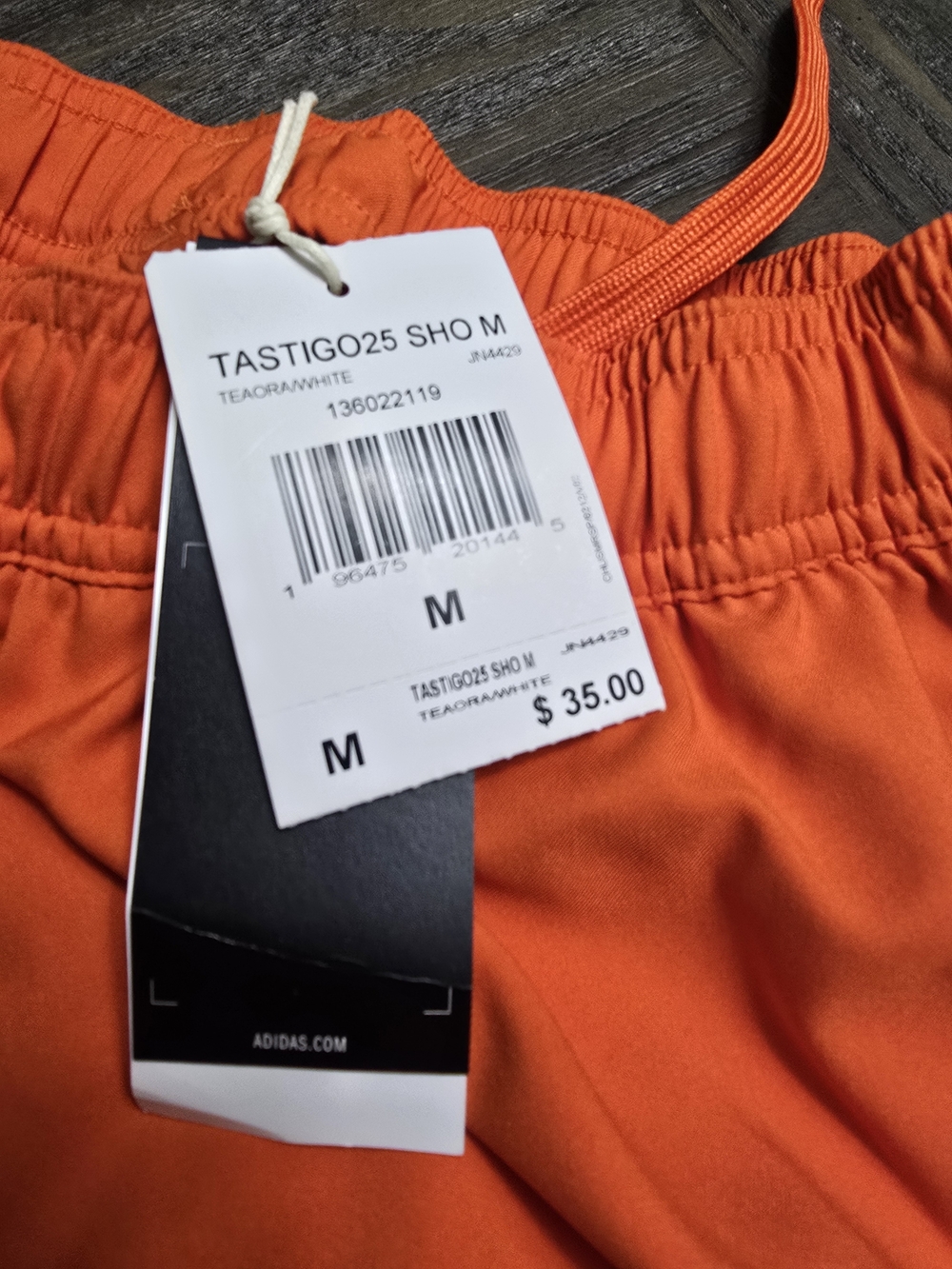 adidas Orange Athletic Shorts with White Side Stripes - Picture 2 of 3